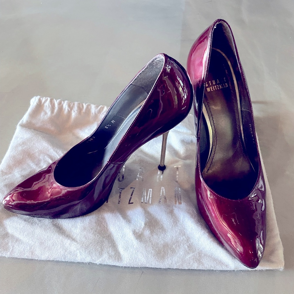 Beautiful metalic burgundy Stuart Weitzman heels. Used only couple of times.
